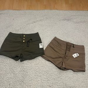 Two pair of shorts sold together! Never Worn! Tags attached
